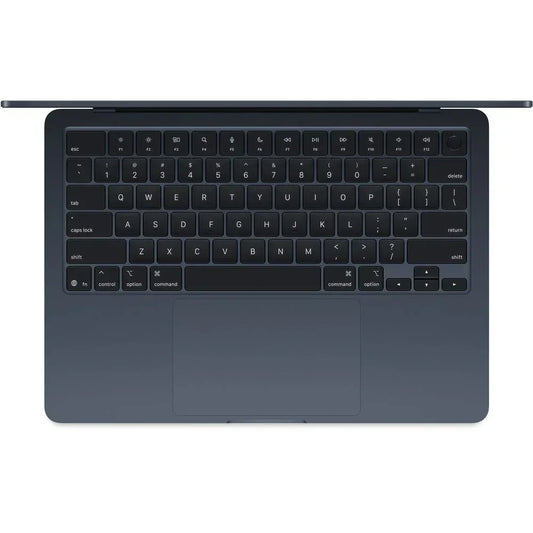 Vista superior de teclado notebook compacto color negro, tecnología portátil en Tecatech-uy